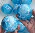 Half Coconut oil half slush filled with big cracking snow ball slushy sound fidget toys stress relief