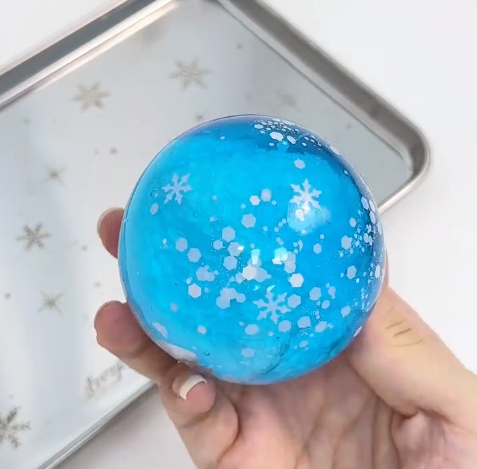 Half Coconut oil half slush filled with big cracking snow ball slushy sound fidget toys stress relief